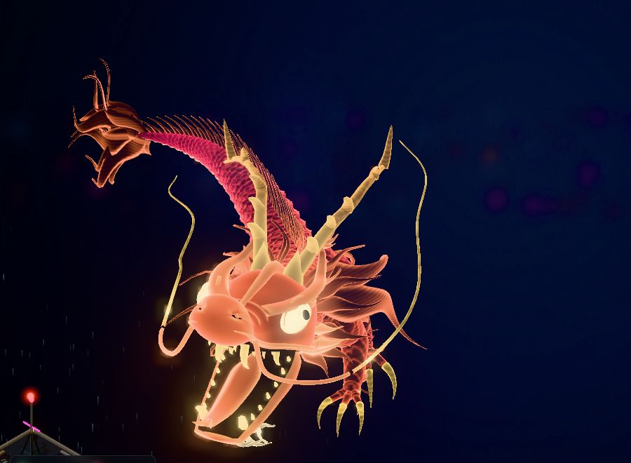 The dragon hologram head at Run 233, with an open dark mouth and a row of gold teeth.